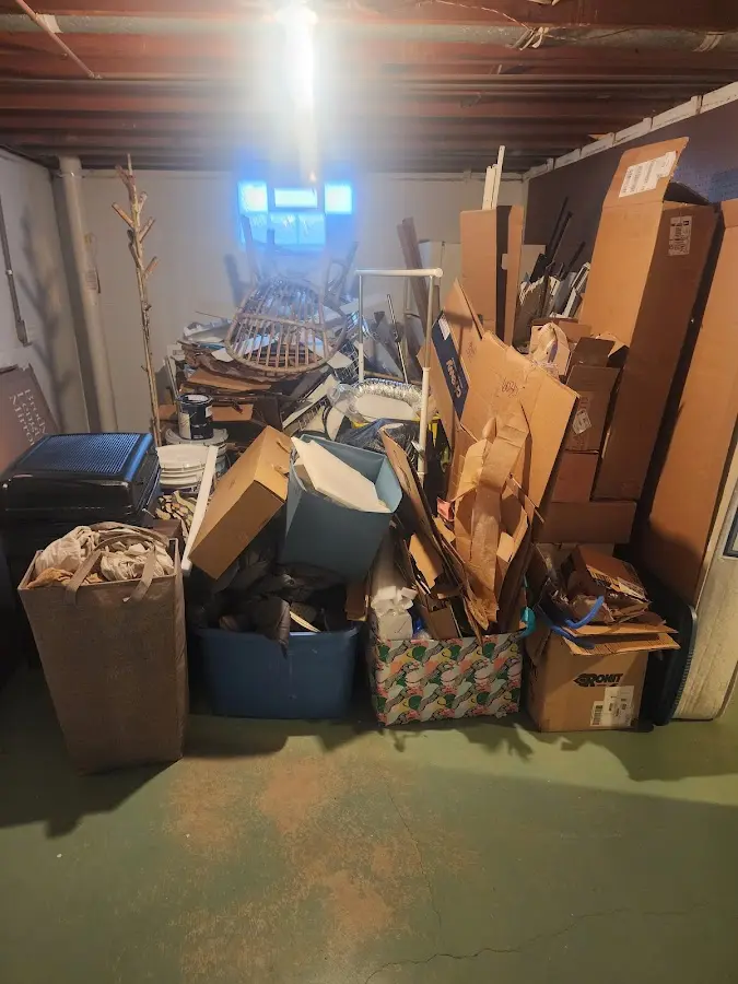 Roll-off dumpster container at job site for 4 Yard Dumpster Rental in Verona